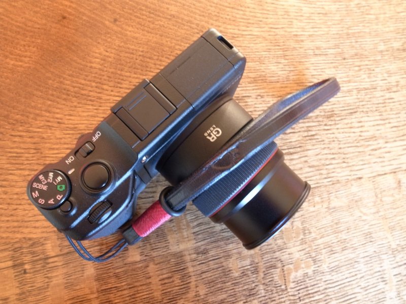 Ricoh GXR with Footprint wrist strap.JPG